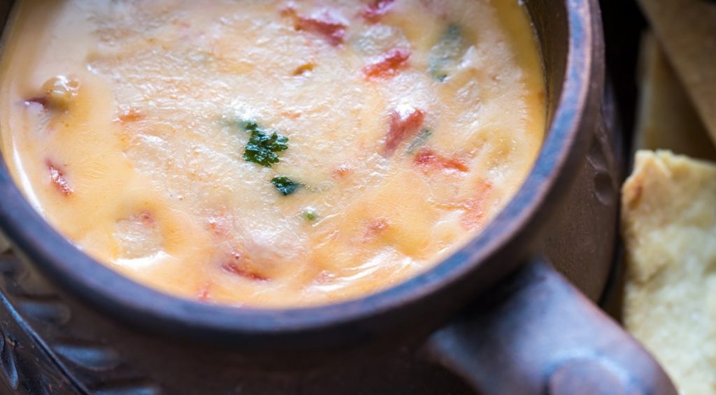 Velveeta Queso Dip and other recipes from the side of a box.